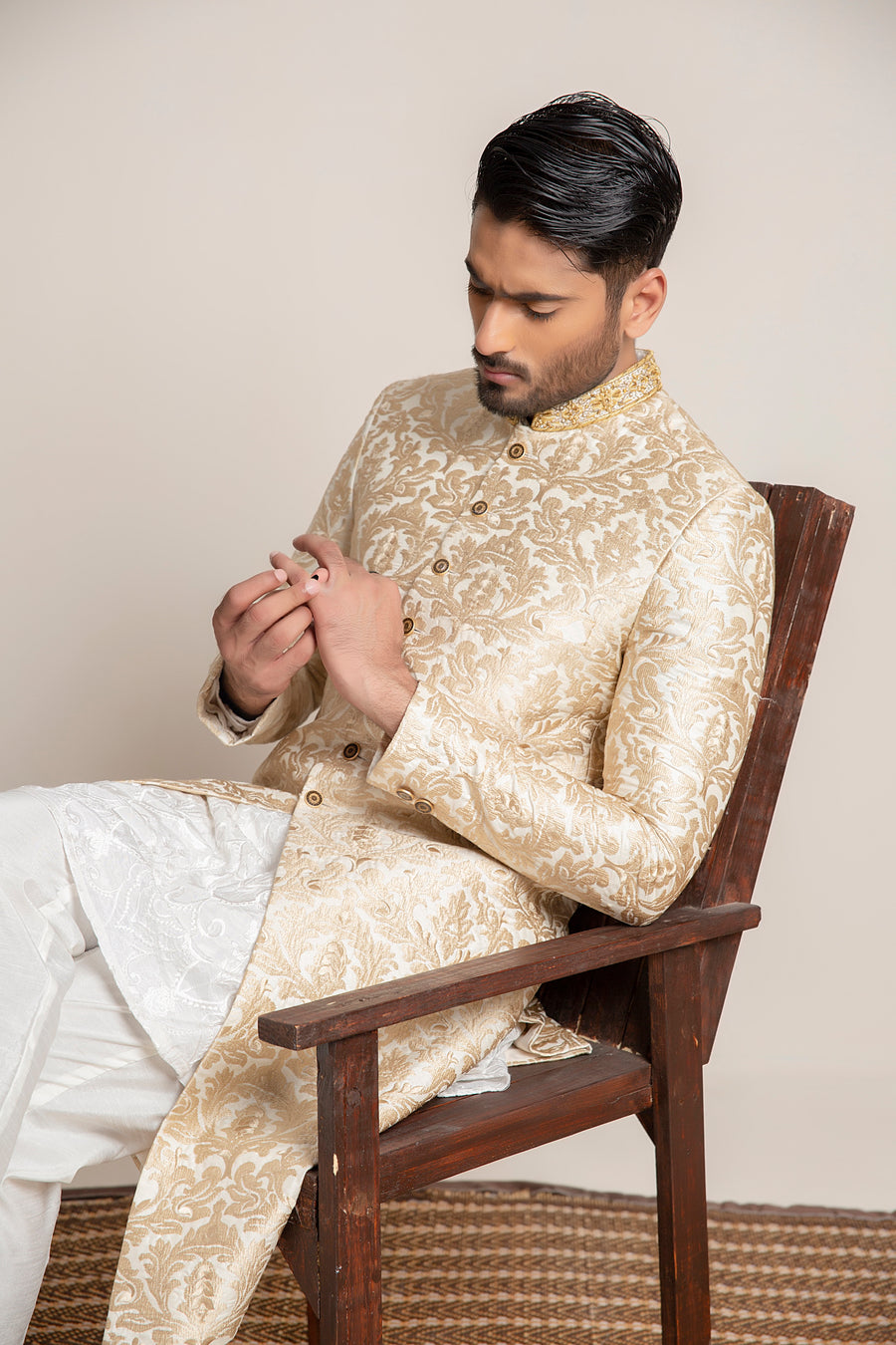 Golden embroidered Sherwani with hand work on collar