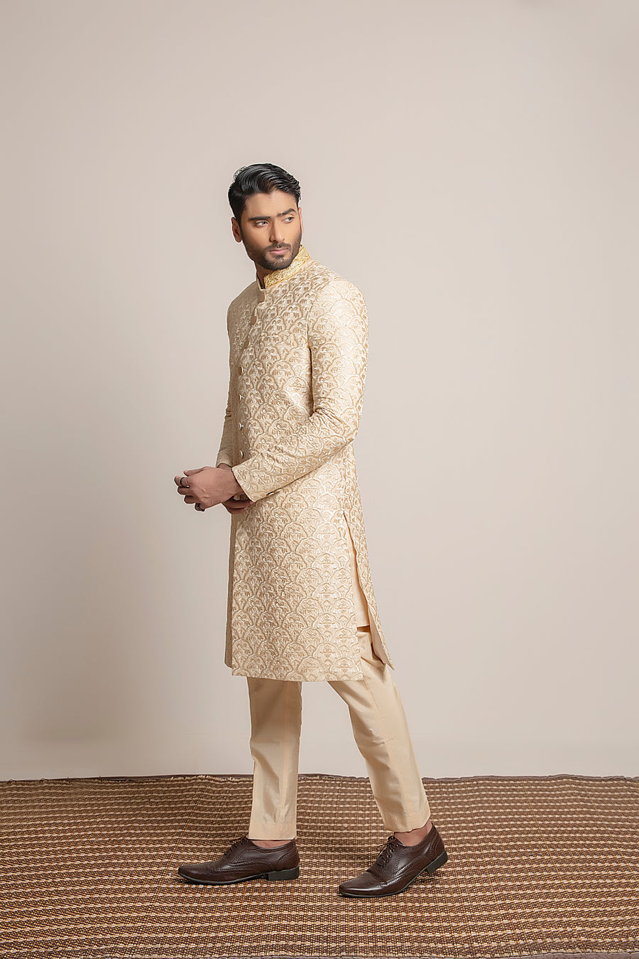 Golden embroidered Sherwani with hand work on collar