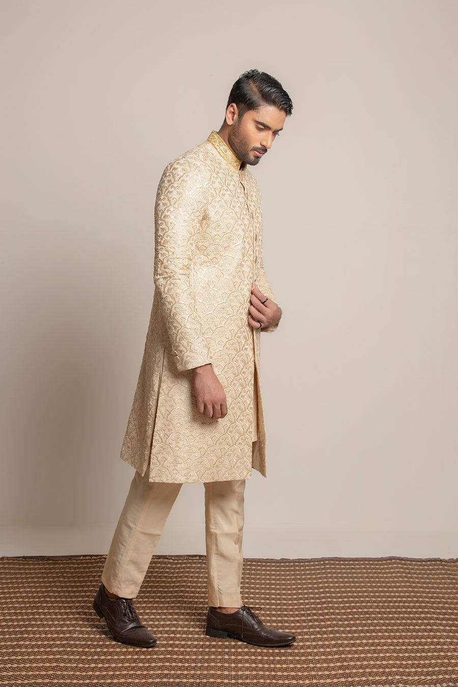 Golden embroidered Sherwani with hand work on collar