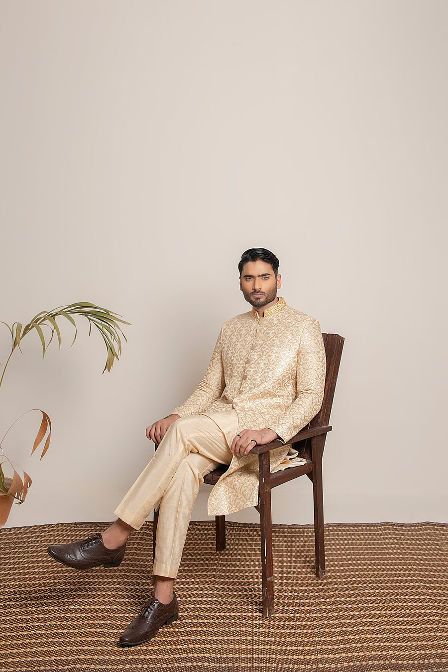 Golden embroidered Sherwani with hand work on collar