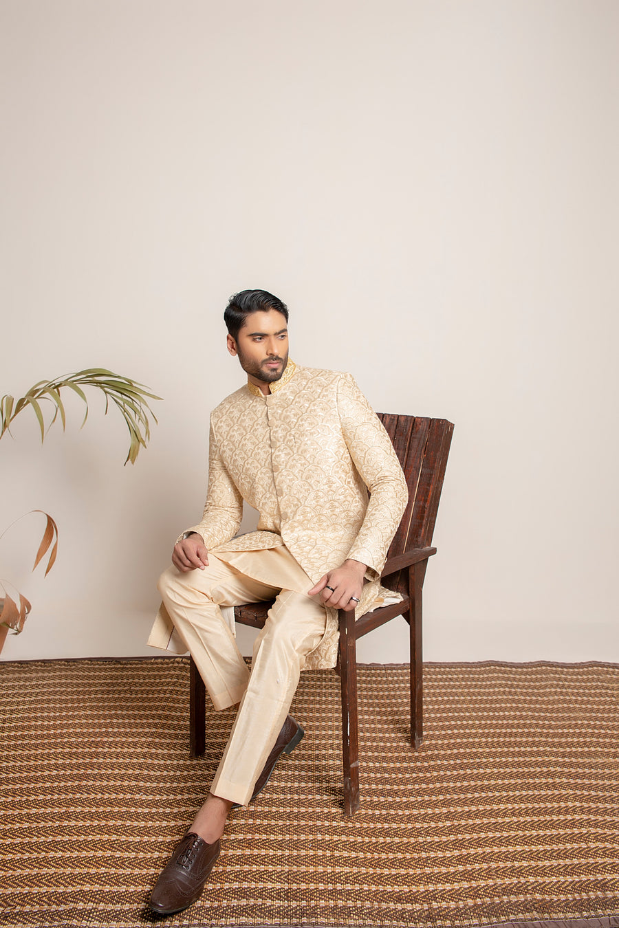 Golden embroidered Sherwani with hand work on collar