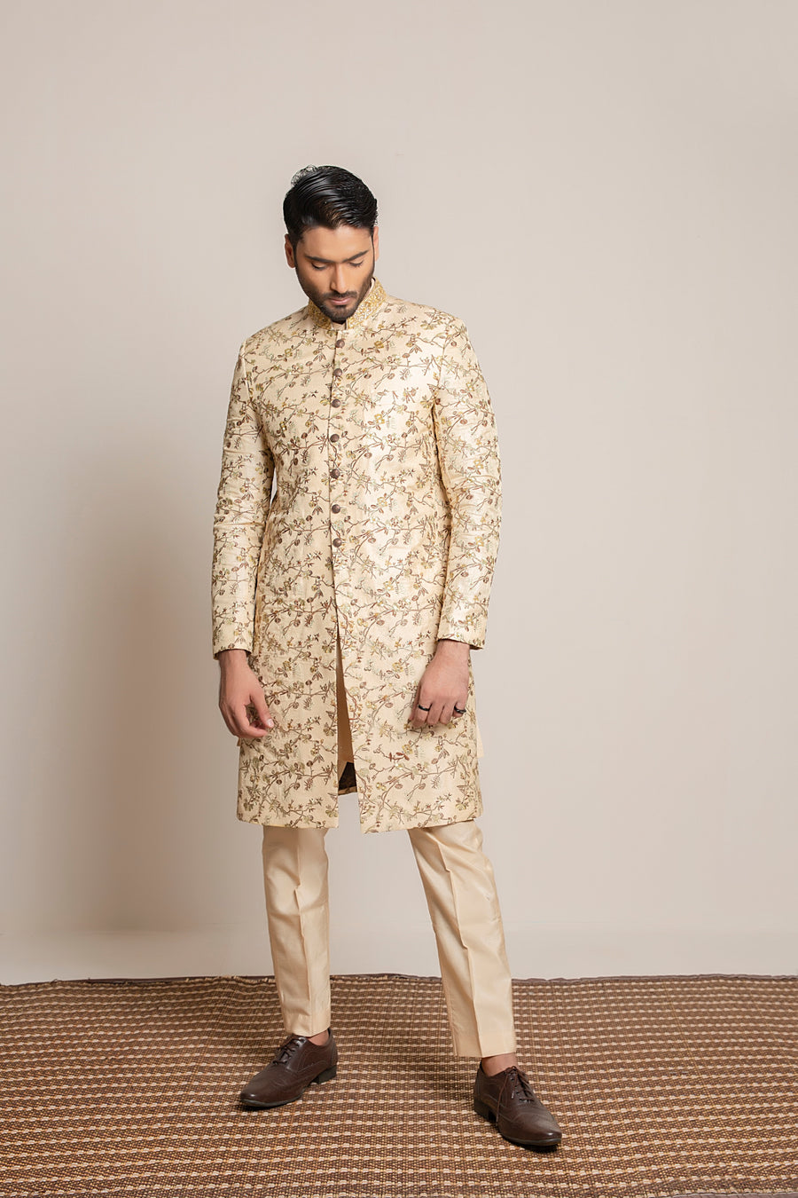 Golden embroidered Sherwani with hand work on collar