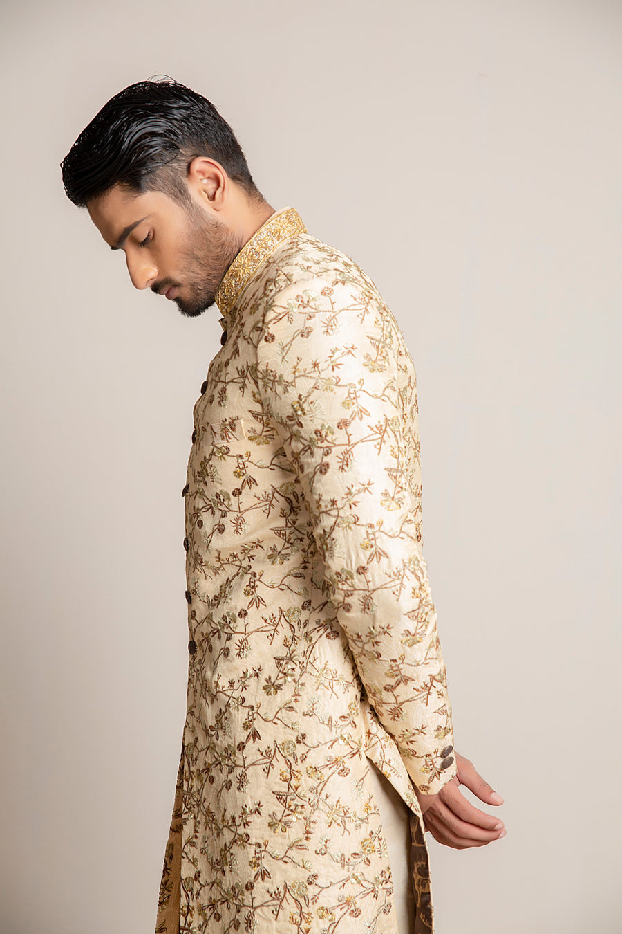 Golden embroidered Sherwani with hand work on collar