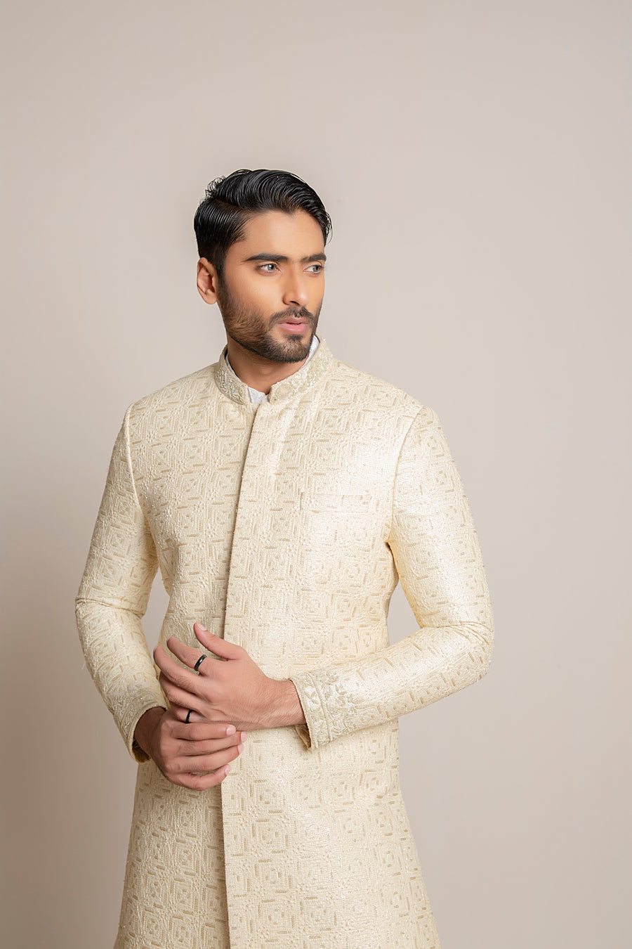 Cream embroidered Sherwani with hand work on collar and sleeves